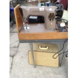 A SINGER EM896998 SEWING MACHINE IN CASE IN WORKING ORDER