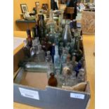 A LARGE COLLECTION OF VINTAGE BOTTLES