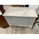 A PAINTED CHEST OF THREE DRAWERS
