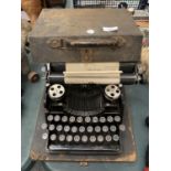 A VINTAGE CASED TYPEWRITER