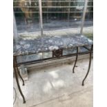 A MARBLE SIDE TABLE WITH CAST IRON SUPPORTS
