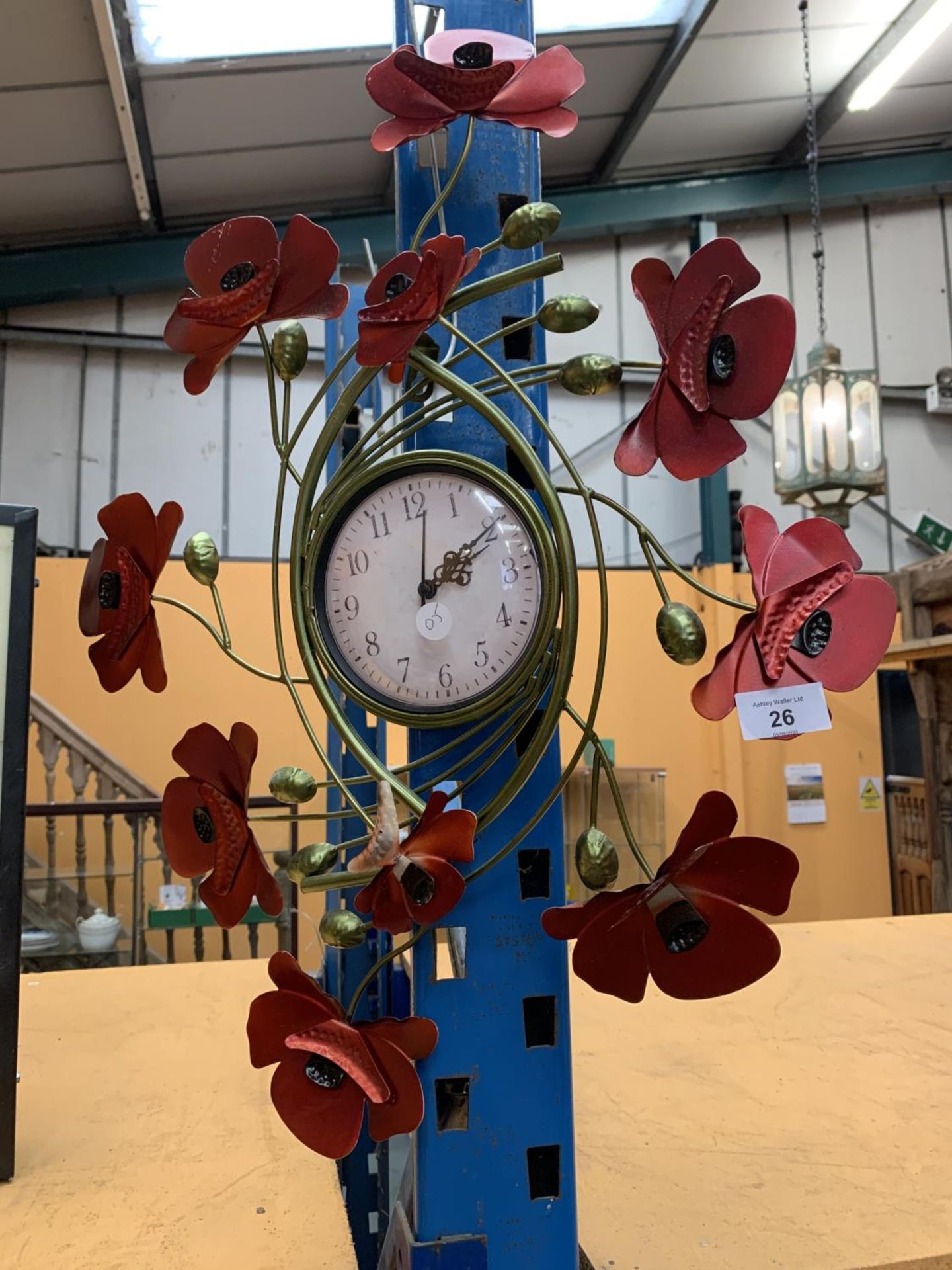 A POPPY DESIGN METAL WALL CLOCK - Image 2 of 2