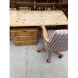 A PINE DESK WITH THREE DRAWERS AND A MATCHING CHAIR