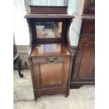 A MAHOGANY COAL CABINET WITH ROLL OUT DOOR WAVING GALVANISED LINER AND UPPER MIRROR