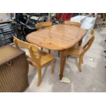 A PINE DINING TABLE AND FOUR CHAIRS