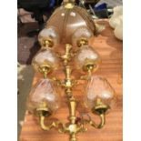 A 1980'S STYLE GLASS CEILING PENDANT TOGETHER WITH THREE WALL LIGHTS OF TWO ARMED BROWN FLUTED GLASS