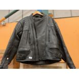 A BLACK LEATHER MOTORCYCLE JACKET