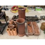 A COLLECTION OF TERRACOTTA ITEMS TO INCLUDE TROUGHD, POTS ETC (SOME A/F)