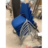 EIGHT BLUE SEATED STACKING CHAIRS