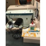 A SINGER 257 SEWING MACHINE WITH CASE, IN WORKING ORDER