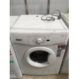 A WHIRLPOOL 5.5 KG WASHING MACHINE, SLIGHT DAMAGE TO TOP (SEE PHOTO), CLEAN CONDITION, IN WORKING