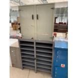 A METAL SHELVING RACK AND A METAL TWO DOOR CABINET