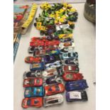 A LARGE COLLECTION OF CARS