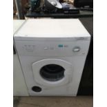 A CREDA SIMPLICITY DRYER, FRONT CAP MISSING (SEE PHOTO) IN WORKING ORDER