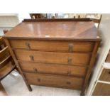 AN OAK CHEST OF FOUR DRAWERS