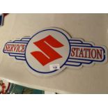 A 'SUZUKI SERVICE STAION' METAL SIGN