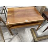 A TEAK COFFEE TABLE