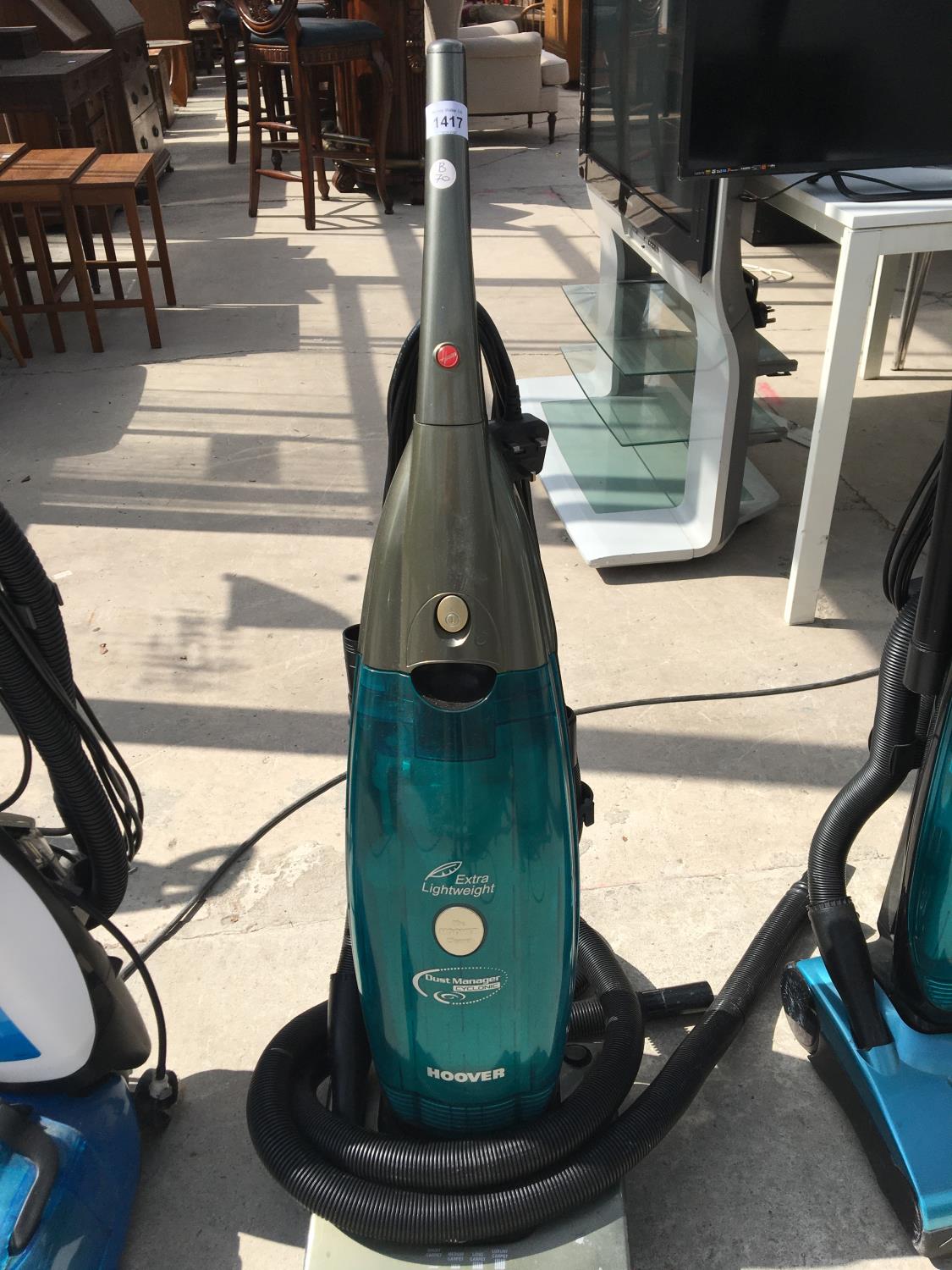 A HOOVER 2000W DUST MANAGER CYCLONIC VACUUM, IN WORKING ORDER