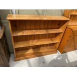 A PINE THREE TIER BOOKCASE