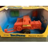 AN ERTL BIG FARM SQUARE BALER