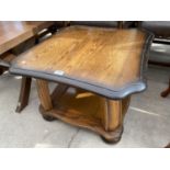 A SQUARE OAK COFFEE TABLE WITH LOWER SHELF