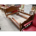 A ROSSMORE FURNITURE CHERRY WOOD DOUBLE BED