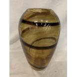 A LARGE GLASS VASE WITH BROWN AND GOLD GLITTER SWIRL DESIGN