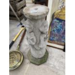 AN ORIENTAL STYLE CONCRETE BIRDBATH STAND