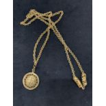 A LONG SILVER ORIENTAL FOB NECKLACE