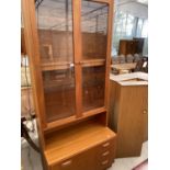 A G PLAN TEAK CABINET WITH THREE DRAWERS AND TWO GLAZED DOORS
