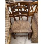 AN OAK DINING CHAIR WITH WOVEN SEAT