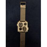 A SQUARE FOUR FACED WRISTWATCH