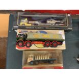 THREE BOXED MODEL VEHICLES TO INLCUDE A TRUCK SERIES, A CORGI EDDIE STOBART AND A MODELS OF YESTER