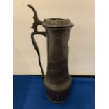 AN ARTS AND CRAFTS PEWTER LIDDED WINE JUG