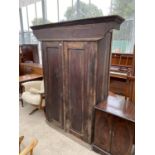 A PITCH PINE CABINET WITH TWO DOORS