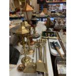A COLLECTION OF METALWARE MAINLY BRASS TO INCLUDE LAMPS, FIRE TOOLS ETC