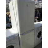 AN INDESIT FRIDGE FREEZER ONE DOOR COMPARTMENT MISSING, BELIEVED WORKING