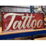 A TATTOO ILLUMINATED LIGHT BOX SIGN