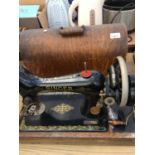 A SINGER SEWING MACHINE Y8470762 IN CASE