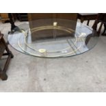 A GLASS AND BRASS COFFEE TABLE ON CLEAR PERSPEX SUPPORTS
