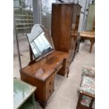A WALNUT DRESSING TABLE WITH FIVE DRAWERS AND UNFRAMED MIRROR AND A MATCHING WARDROBE WITH TWO DOORS