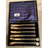 WHITE METAL HANDLED KNIVES IN A CASE