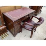 A MAHOGANY DESK WITH NINE DRAWERS, RED LEATHER WRITING SURFACE AND MATCHING STUDDED LEATHER CHAIR