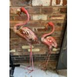 A PAIR OF METAL PINK FLAMINGOS