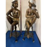 AN IMPRESSIVE PAIR OF BRONZE ART DECO STYLE LADIES ON CAST METAL STOOLS