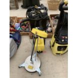 A KARCHER PRESSURE WASHER WITH ATTACHMENTS