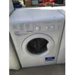 AN INDESIT 8KG WASHER, BELIEVED WORKING - SEE BELOW