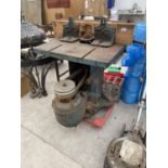 A CAST IRON WOODWORKING MOULDING MACHINE