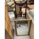 A GILT FRAMED MIRROR AND CARVED MAHOGANY DINING CHAIR