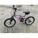 A MAGNA CHILD'S MOUNTAIN BIKE